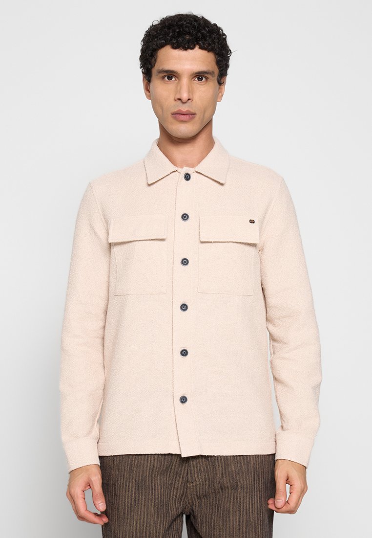 FULL BUTTON STRETCH Media 1