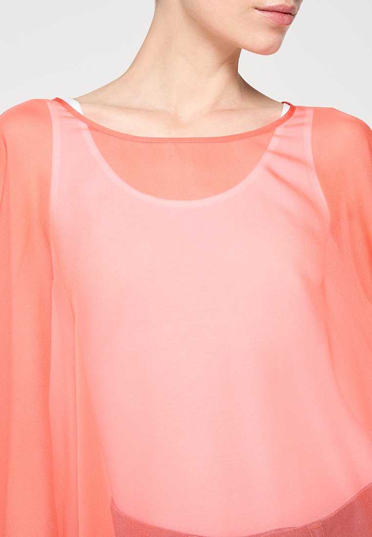 comma Cape Media 3