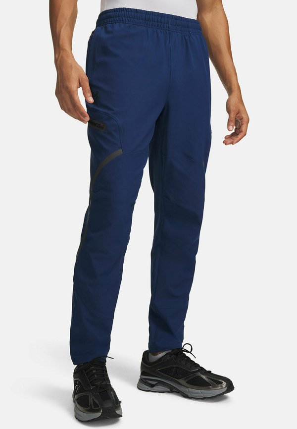 Under Armour UNSTOPPABLE - Tracksuit bottoms - downpour gray
