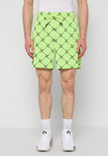Limettengrüne Badeshorts mit schwarzem Rautenmuster, elastischem Bund und Kordelzug, mit Seitentaschen. Hergestellt aus leichtem Stoff.
