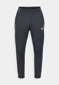 Under Armour CHALLENGER TRAINING - Tracksuit bottoms - black/white