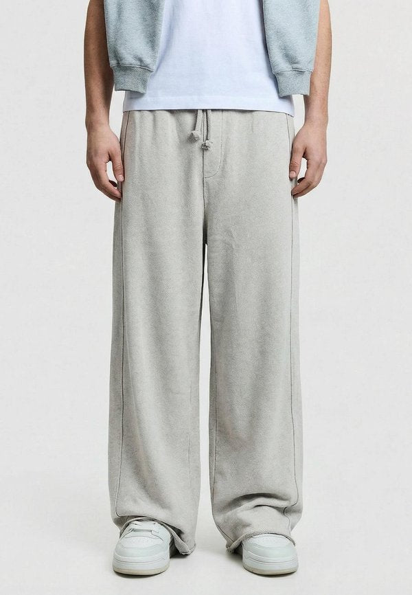 Bershka SUPER BAGGY WASHED  - Tracksuit bottoms - light grey