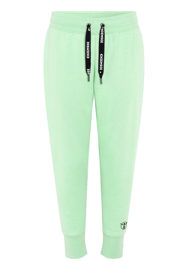 Hellgrüne Sweatpants mit einem elastischen Taillenbund, schwarzen Kordeln, gerippten Bündchen und einem kleinen Logo am Saum. Sanfte Textur.