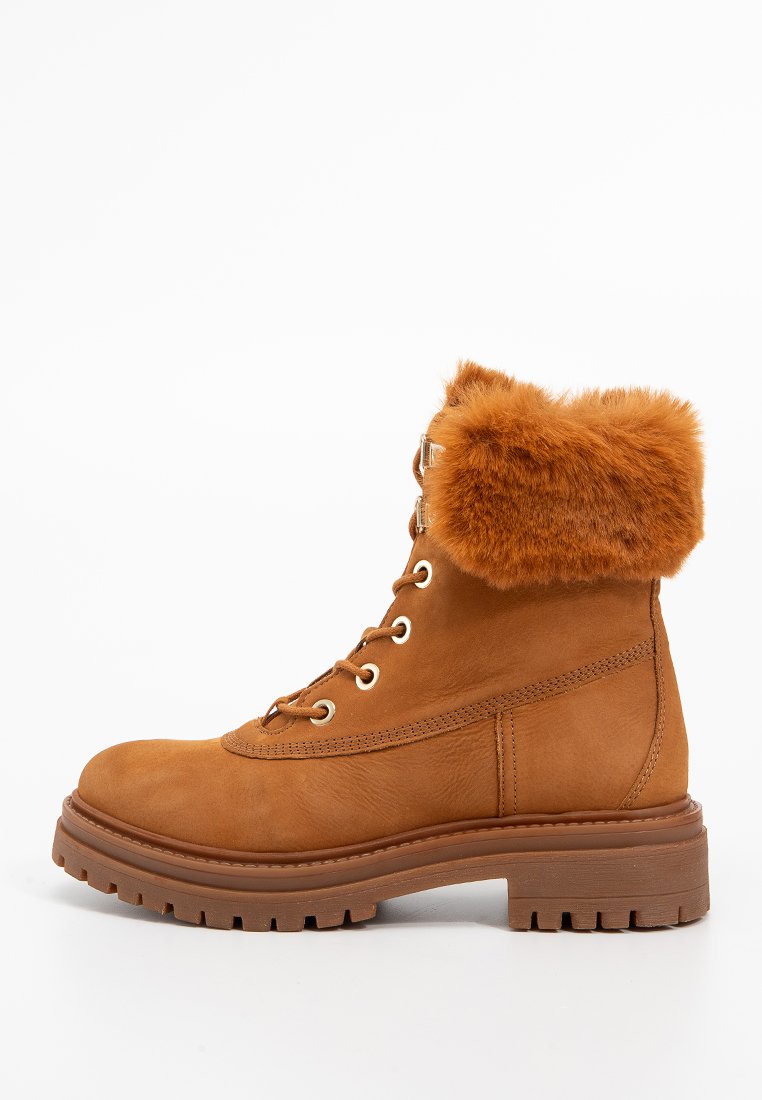 Tanfarbene Lederknöchelboots mit einem Kunstfellkragen, runder Zehenform und Schnürdesign. Robuste Gummisohle mit strukturiertem Profil für besseren Halt.