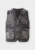 Denimweste in einem verblassten Schwarz, mit Reißverschluss, fünf Taschen und ärmellosem Design. Strukturierter Stoff mit sichtbaren Nähten.