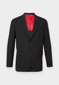 Schwarzer Blazer aus leichtem Stoff, mit rotem Satinfutter, zwei vorderen Knöpfen und zwei Seitentaschen sowie einer einzelnen Brusttasche.