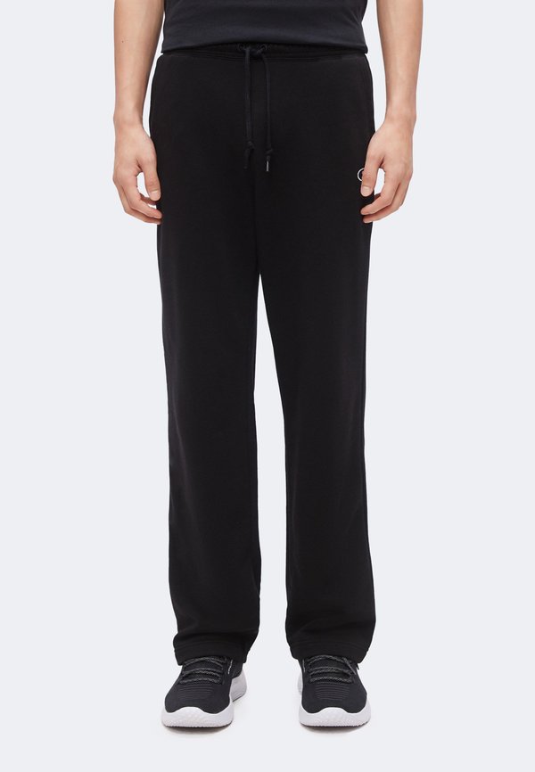 Under Armour RIVAL PANTS - Tracksuit bottoms - ultimate black/white