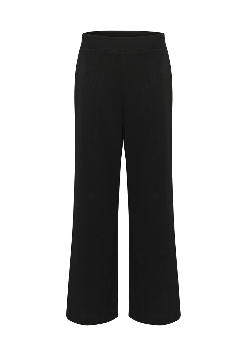 Schwarze, weite Hosen aus weichem, dehnbaren Material. Mit einem glatten, elastischen Bund und einer geraden Silhouette ohne sichtbare Muster.