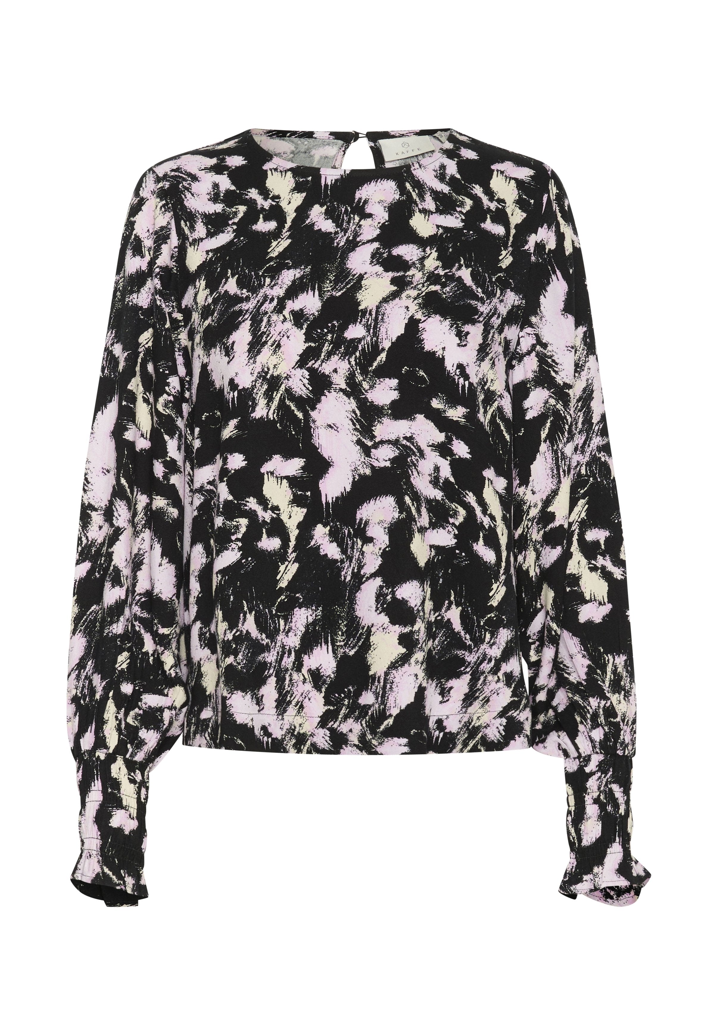 Langärmlige schwarze Bluse mit einem abstrahierten Muster in Rosa und Creme, Rundhalsausschnitt und gerafften Manschetten. Weicher Stoff mit einer lockeren Passform.