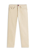 Beige Slim-Fit-Jeans mit fünf Taschen, Gürtelschlaufen, Reißverschluss, Knopfverschluss und kleinem Tommy Hilfiger Logo auf der Vorderseite.