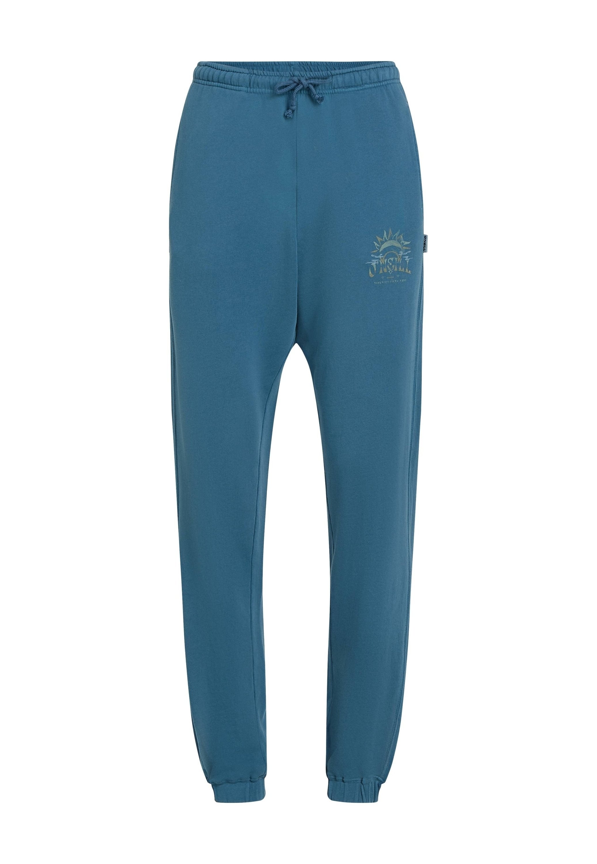 Hellblaue Jogginghose mit elastischem Bund und Kordelzug. Verziert mit einem dekorativen Sonnengrafik in Gold auf dem linken Oberschenkel. Mit Bündchen an den Knöcheln.