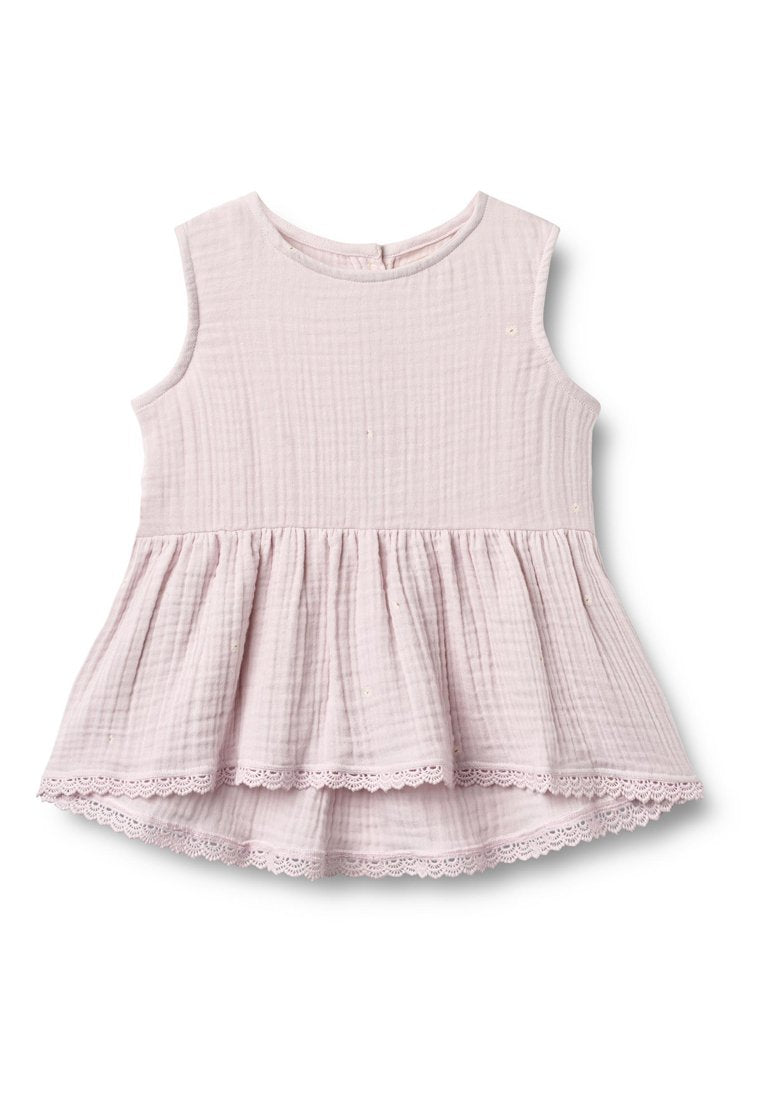 Pinkes ärmelloses Oberteil aus strukturiertem Stoff mit einem Peplum-Saum, das am unteren Rand eine Spitzenverzierung sowie kleine dekorative Akzente aufweist.