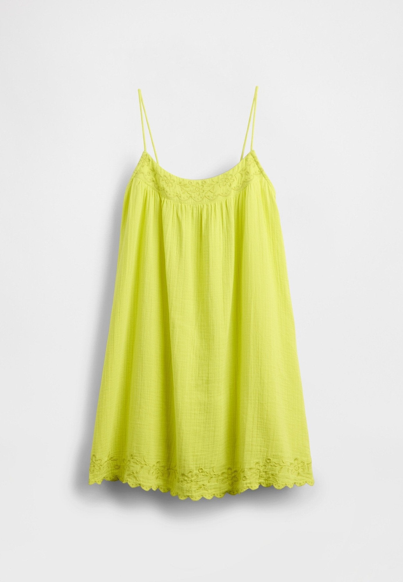 Limettengrünes Trägerkleid mit dünnen Trägern, strukturiertem Stoff, elastischem Oberteil und gezacktem Spitzenabschluss mit Blumenstickerei.
