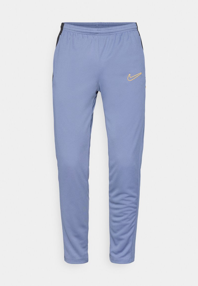 Helle blaue Sporthose aus weichem Stoff, mit schwarzen Seitenstreifen, einem elastischen Bund und einem gelben Nike-Logo am linken Oberschenkel.