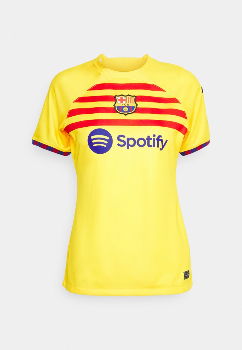 Gelbes Fußballtrikot mit roten und goldenen Streifen, verziert mit dem FC Barcelona-Wappen und einem Spotify-Logo. Kurze Ärmel und runder Halsausschnitt.