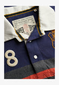 Superdry & Co DOUBLE EMBLEM SHORT SLEEVE RUGBY - Polo shirt - navy orange chest band stripe