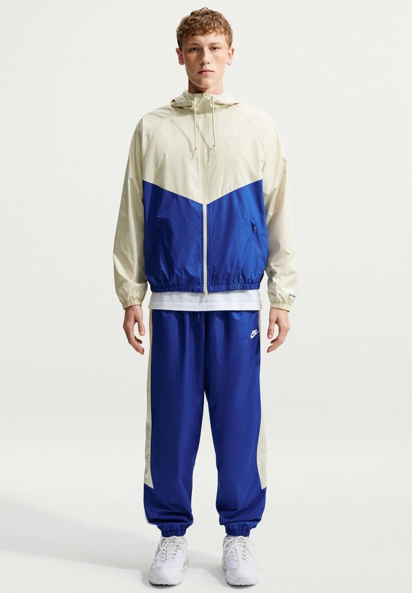 Nike Sportswear Light jacket - light khaki old royal white