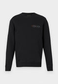Schwarzer Pullover aus Baumwollmischung mit Rundhalsausschnitt und langen Ärmeln. Auffälliges, farbenfrohes rundes Logo auf der Brust. Glatte Textur.