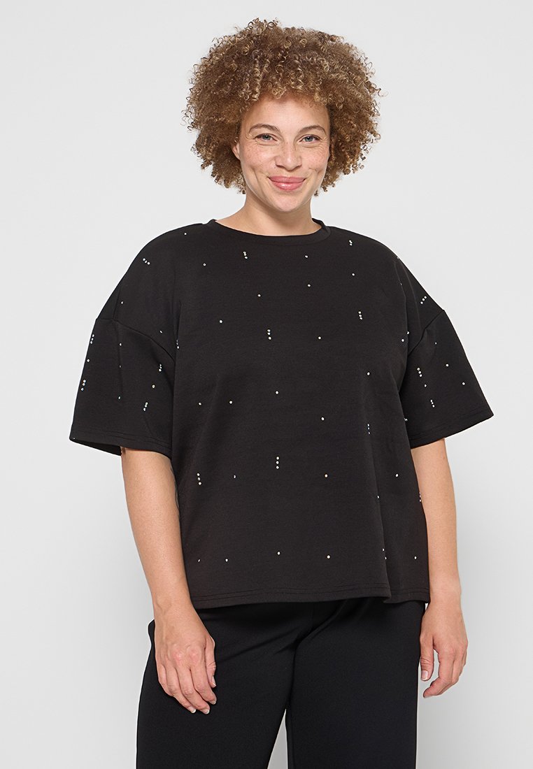 Schwarzes T-Shirt mit kurzen Ärmeln in lockerer Passform, das mit verstreuten Strassakzenten dekoriert ist. Weicher Stoff mit glatter Textur.