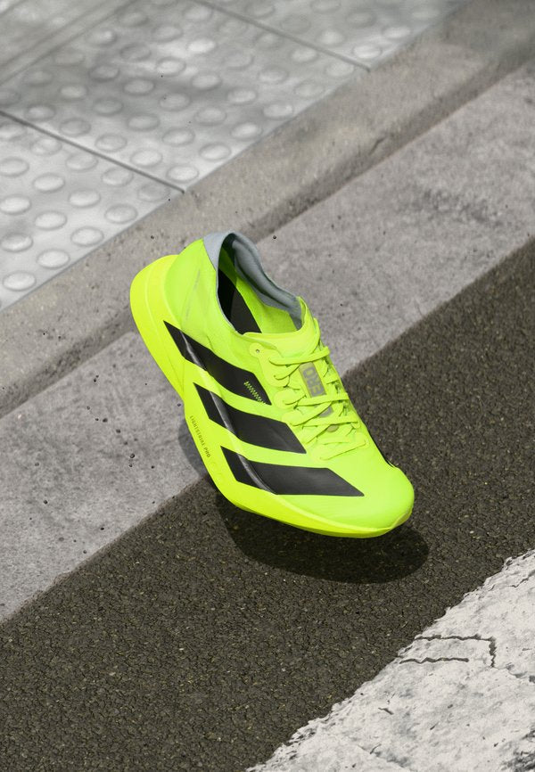 adidas Performance ADIZERO ADIOS PRO 4 - Road running shoes - lucid lemon/core black/halo silver-coloured