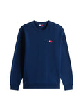 Marinblaues Sweatshirt aus Baumwolle, mit Rundhalsausschnitt, langen Ärmeln und einem kleinen Logopatch auf der linken Brust. Glatte Textur.