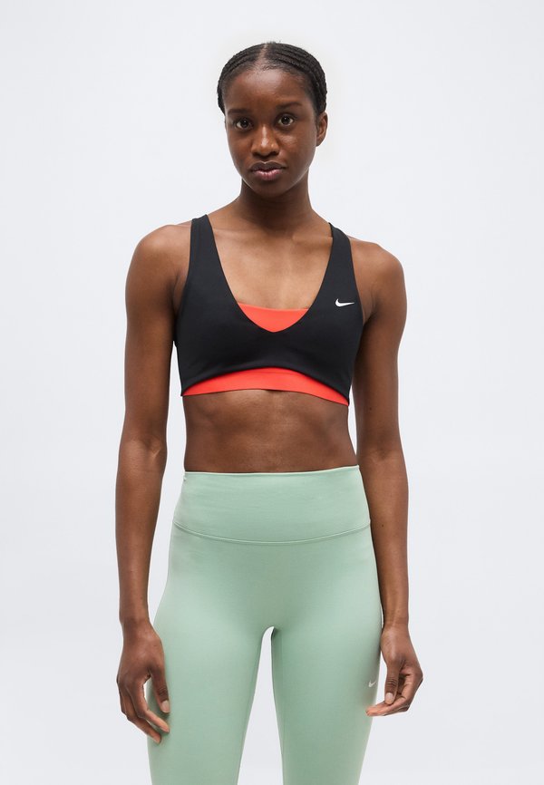 Nike Performance SCULPT STRAPPY BRA - Medium support sports bra - black/light crimson/white