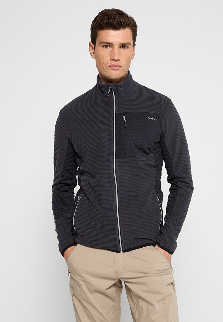 Schwarze Zip-Jacke mit gerippter Textur, kontrastierendem mattem Einsatz und einer Brusttasche. Verfügt über Seitentaschen und elastische Bündchen.