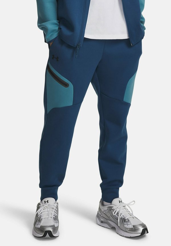 Under Armour UNSTOPPABLE FLEECE - Tracksuit bottoms - wham blue