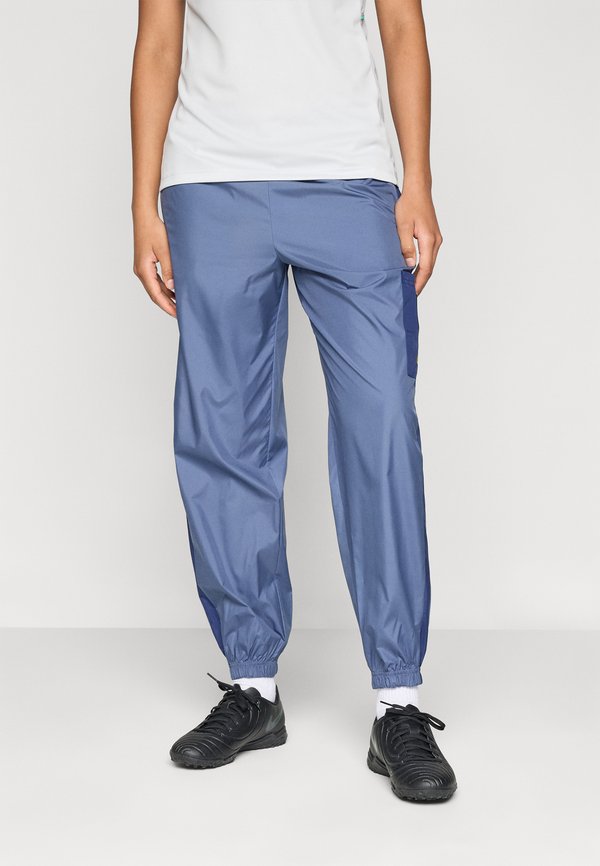Nike Performance ATLÉTICO MADRID ESSENTIAL REPEL JOGGER - Club wear - diffused blue/binary blue/vibrant yellow