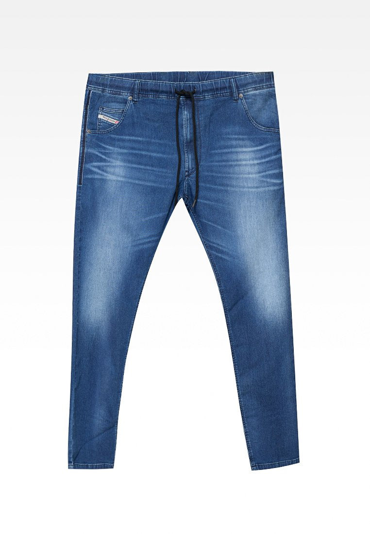 Blaue Jeans-Jogginghosen mit Kordelzug am Bund, zulaufenden Beinen und Vordertaschen. Ausgestattet mit einem ausgewaschenen Look und dezenten Nähdetails.
