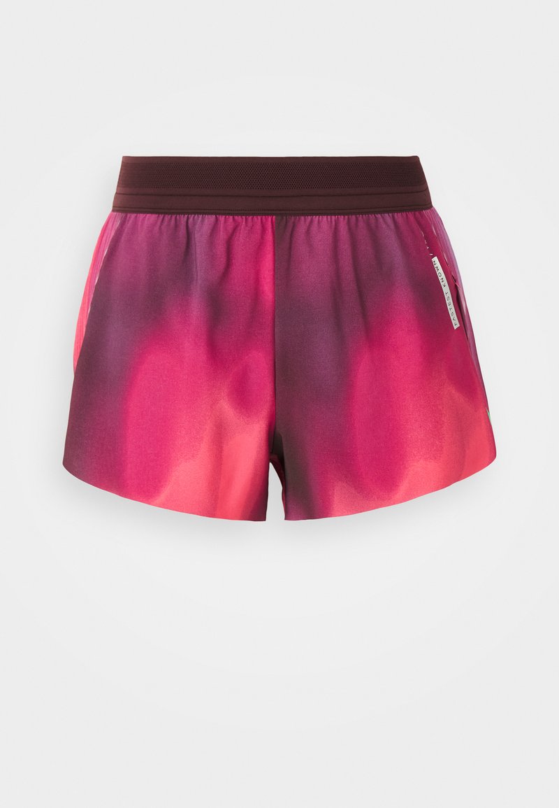 Sportliche Shorts in einem pinken und lila Farbverlauf mit einem elastischen Bund, glatter Textur und einem Etikett an der Seite. Die Shorts haben eine lockere Passform.