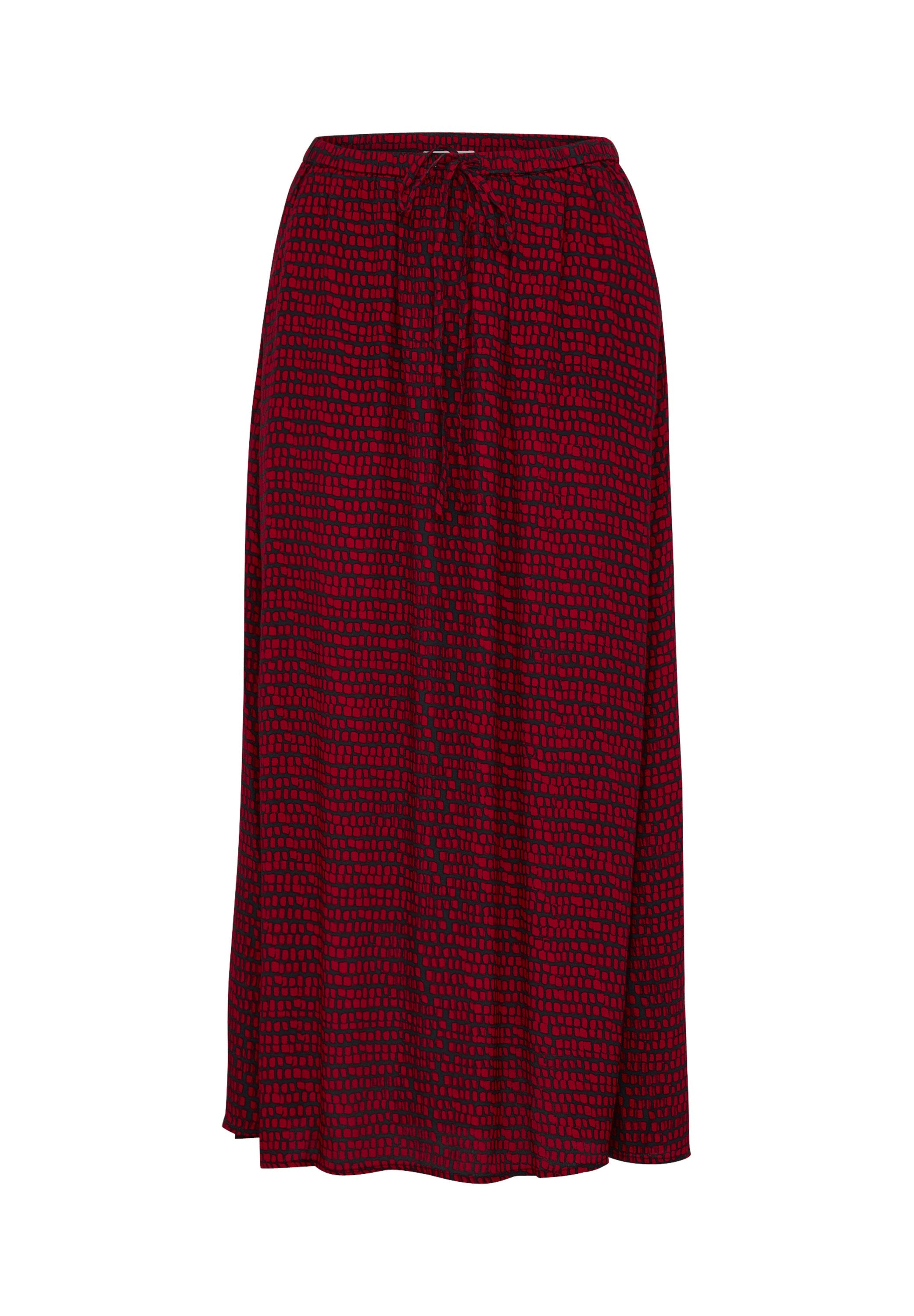 Roter Rock mit einem elastischen Bündchen und Kordelzug. Verfügt über ein strukturiertes Muster, das kleineren Rechtecken in dunklerem Rot ähnelt.