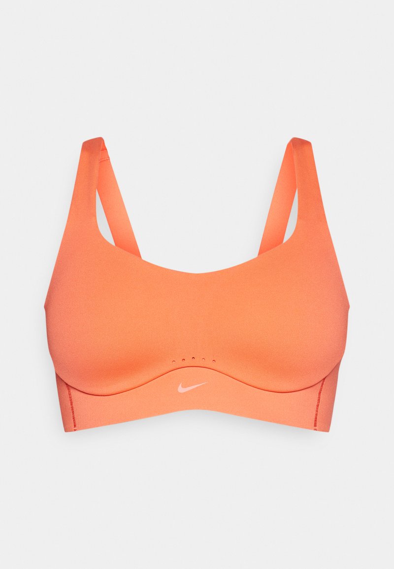 Nike Sport-BH in leuchtendem Orange, aus glattem, dehnbarem Material. Mit breiten Trägern, rundem Ausschnitt und dezentem Logo-Details.