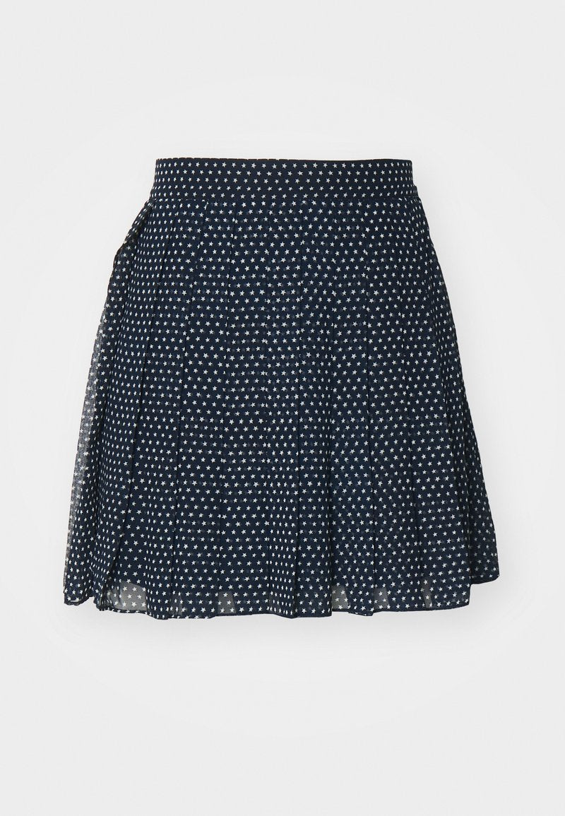 Marineblauer Rock mit kleinem weißen Sternmuster, plissiertem Design, hohem Taillenbund und leichtem Stoff für Bewegungsfreiheit.