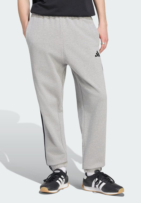 adidas Sportswear ESSENTIALS 3-STRIPES FRENCH TERRY TAPERED CUFFED PANTS - Tracksuit bottoms - medium grey heather/black
