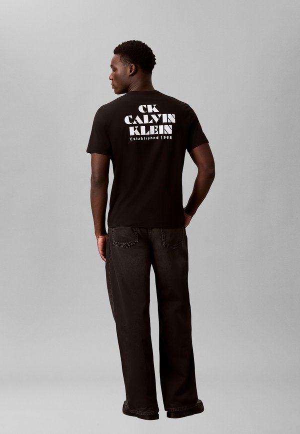 Calvin Klein Jeans RESORT GRAPHIC TEE - Print T-shirt - black