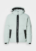 Gepolsterte Jacke in hellem Mintgrün mit hohem Kragen, schwarzem Reißverschluss und zwei Seitentaschen. Besitzt elastische Manschetten und eine minimale Markenkennzeichnung.