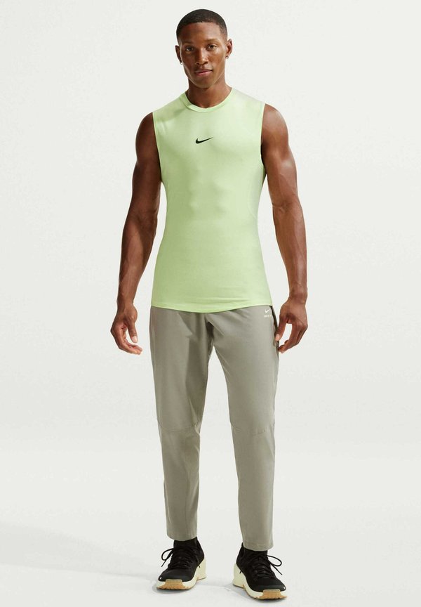Nike Performance M NP DF NPT PANT - Tracksuit bottoms - light army light liquid lime
