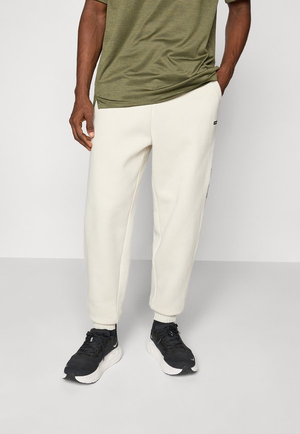 Under Armour ICON HEAVY JOGGER - Tracksuit bottoms - summit white/white