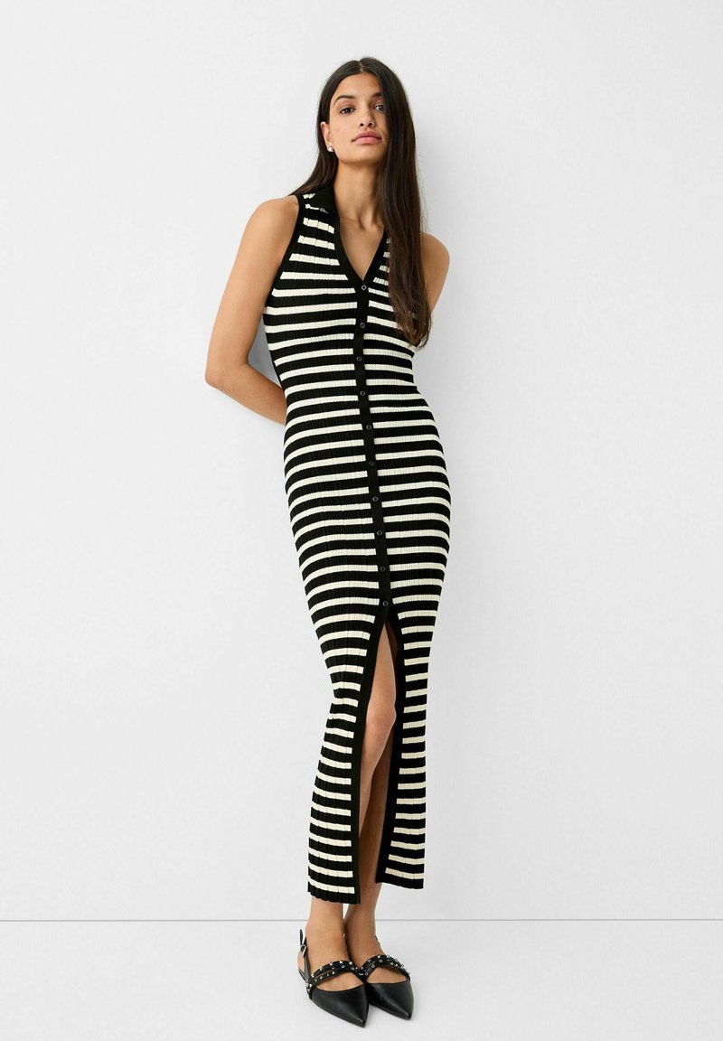 SLEEVELESS CUT-OUT DETAIL  Media 1