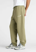 New Balance LINEAR GRAPHIC - Tracksuit bottoms - dark olivine