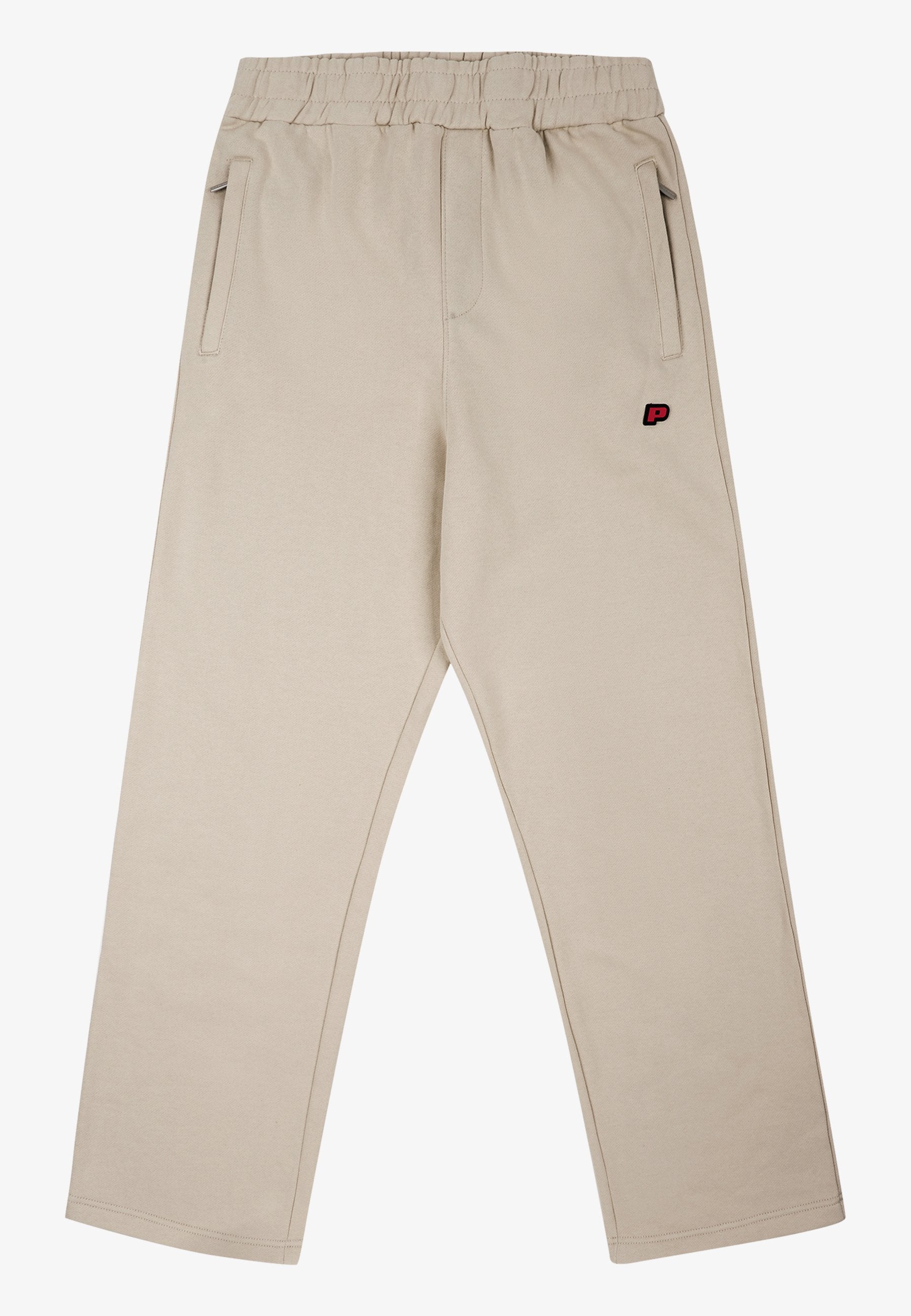 Beige Sweatpants mit elastischem Bund, seitlichen Taschen und einem kleinen roten Logo auf dem linken Oberschenkel. Glattes Gewebe und gerader Schnitt.