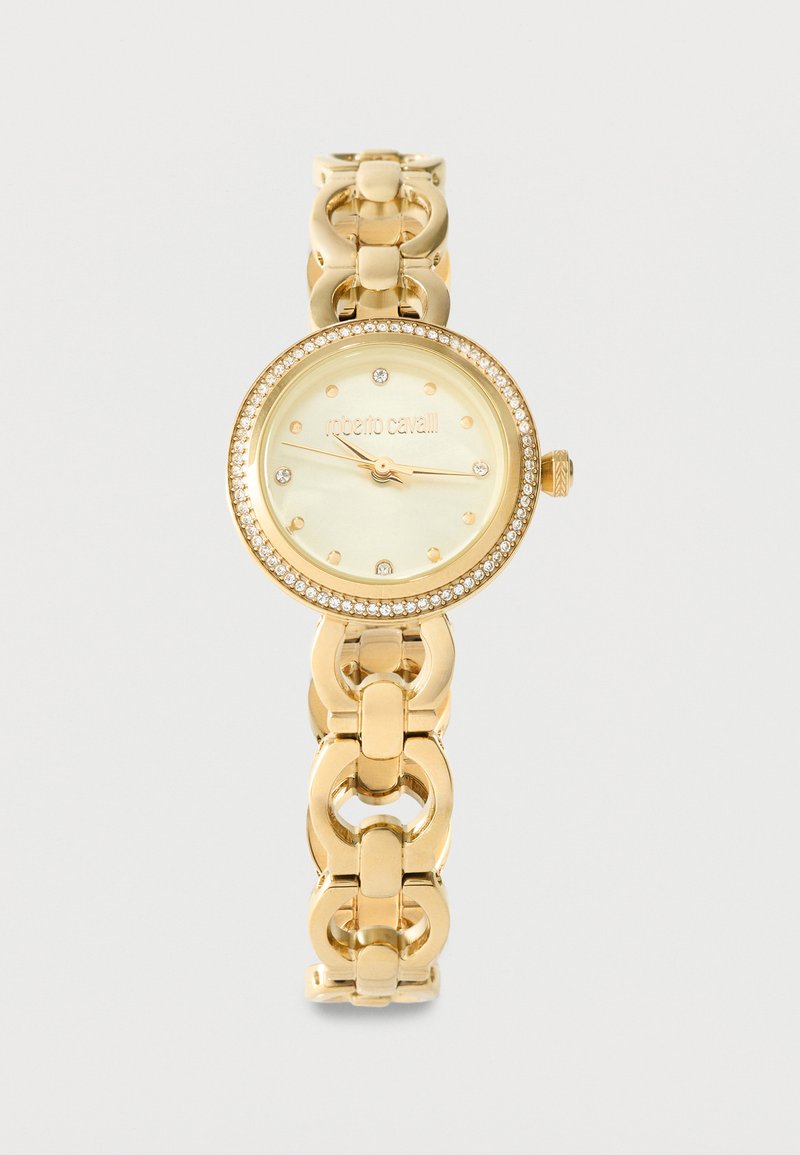 Goldene Armbanduhr mit rundem Zifferblatt, mit Kristallen besetzter Lünette, einfachen Markierungen und drei Zeigern auf hellem Hintergrund.