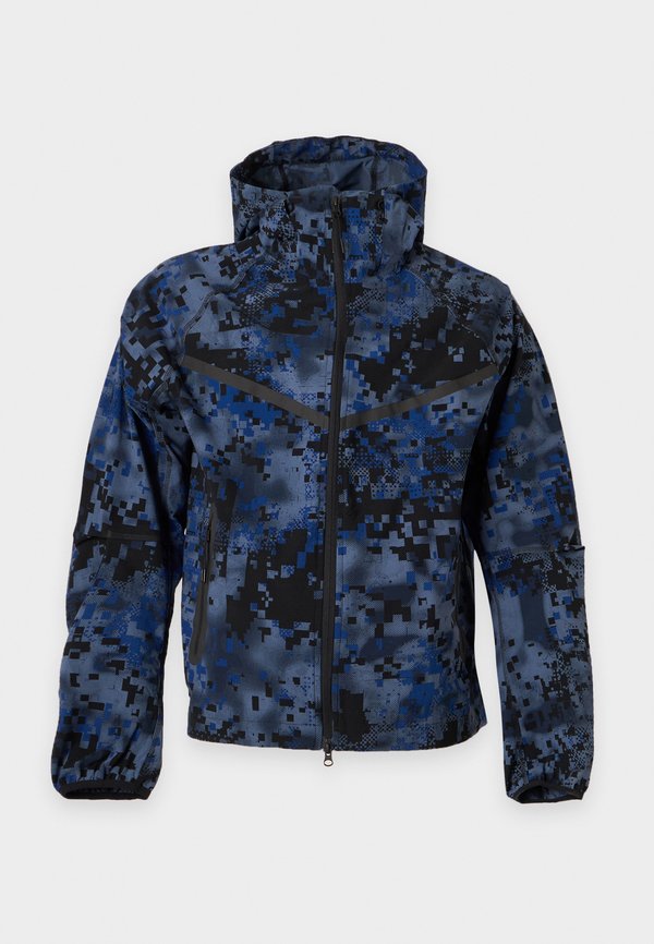 Nike Sportswear M NK TCH DF WVN WR FZ JKT AOP - Light jacket - diffused blue/ black