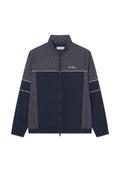 Marinejacke mit einem gemusterten oberen Teil in roten und blauen Kreisen, mit Reißverschluss, Stehkragen und elastischen Bündchen. Verfügt über weiße Akzentstreifen.