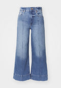 Weite Denim-Jeans in Hellblau, mit hoher Taille, ausgewaschenem Design, Fronttaschen und genähten Details entlang der Beine.