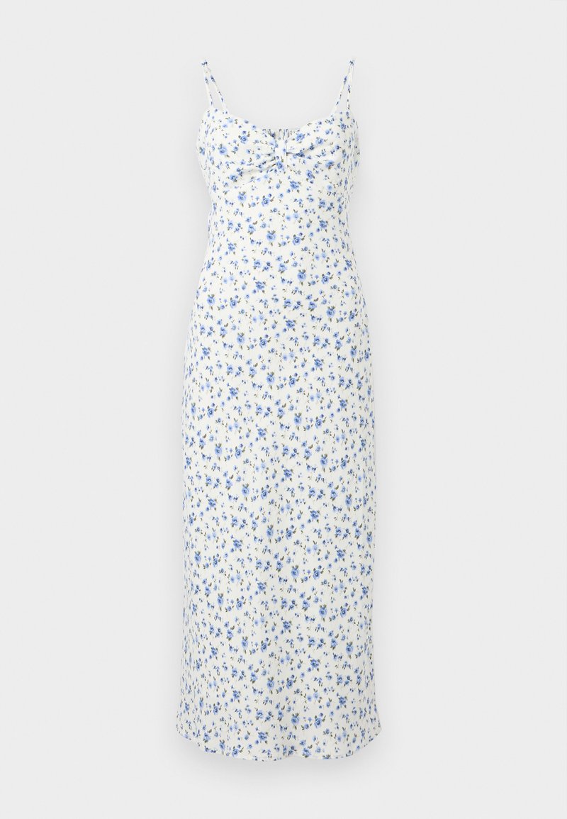 Weißes Midikleid mit dünnen Trägern und blauen Blumenmuster, mit einer gerafften Detail am Ausschnitt.