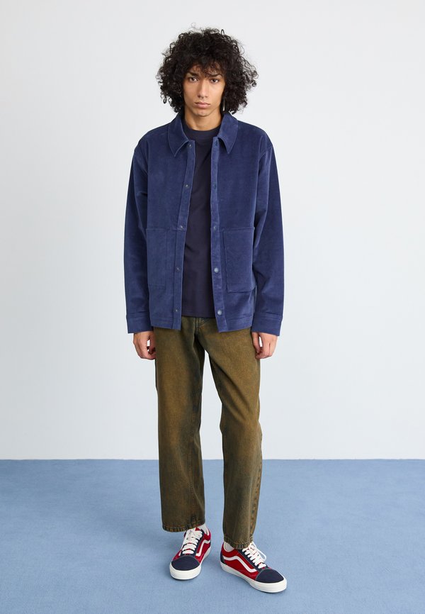 New Balance OVERSHIRT