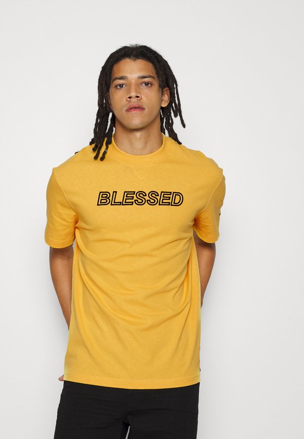 Puma NJR TEE - Print T-shirt - mimosa
