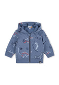 Blaue Kinder Zip-Hoodie mit Kapuze, versehen mit Cartoon-Dinosaurier-Prints in Rot, Weiß und Marineblau. Timberland-Logo am Etikett und Saum.